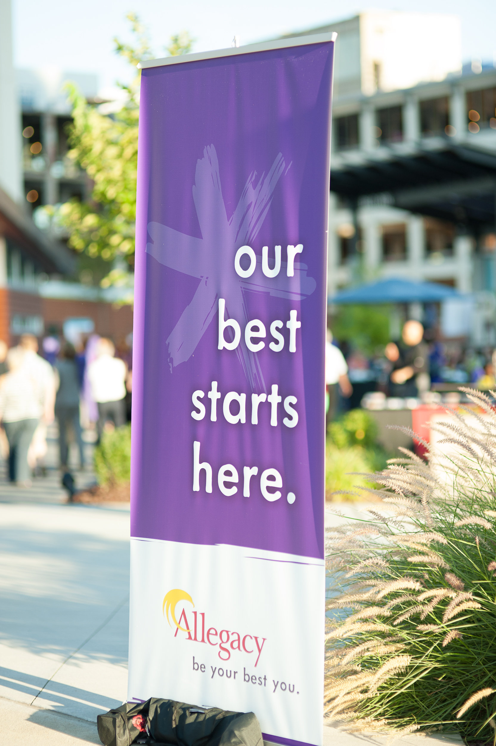 Pop Up Banner at All Staff Event: Our Best Starts Here